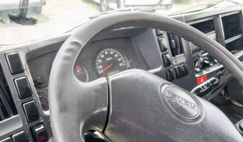 
								Isuzu Elf300 2010 lleno									